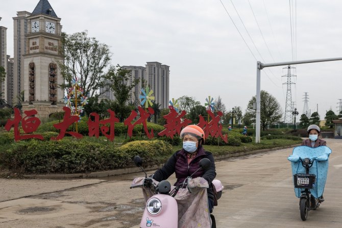 AFP/„Scanpix“ nuotr./Kinijos įmonės „Evergrande“ gyvenamųjų namų kompleksas Uhane 