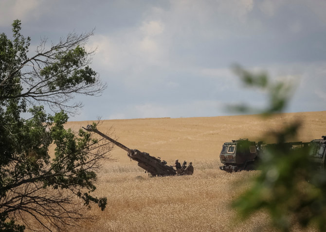 „Reuters“/„Scanpix“ nuotr./Ukrainos kariai netoli fronto linijos