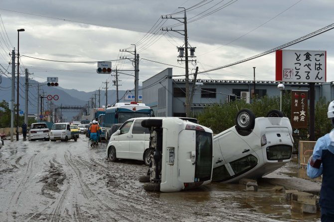 AFP/„Scanpix“ nuotr./Japonijoje prasiautė galingas taifūnas Hagibis