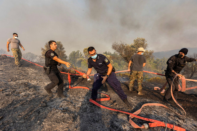 „Reuters“/„Scanpix“ nuotr. / Gaisras Rodo saloje