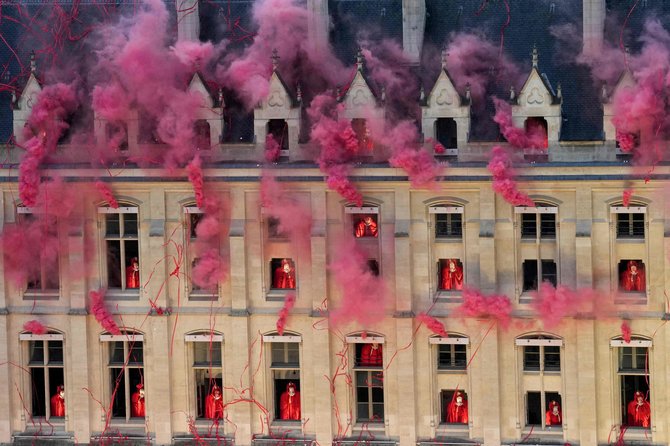 AFP/„Scanpix“ nuotr./Grupės „Gojira“ pasirodymas olimpinių žaidynių atidaryme Paryžiuje