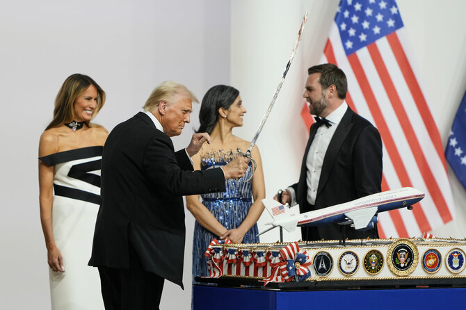 AFP/„Scanpix“ nuotr./Donaldas Trumpas su žmona Melania