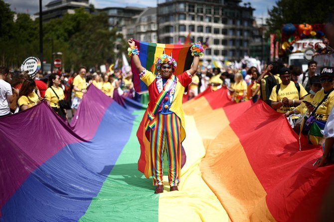 Scanpix nuotr./Londone – pirmojo miesto „Pride“ parado 50-osios metinės