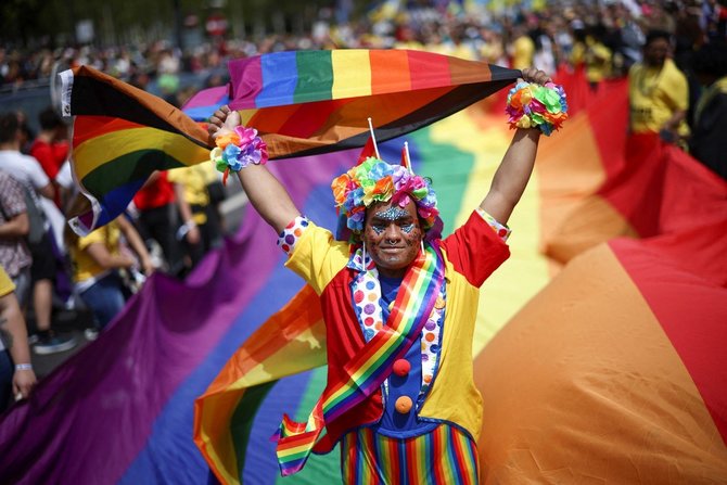 Scanpix nuotr./Londone – pirmojo miesto „Pride“ parado 50-osios metinės