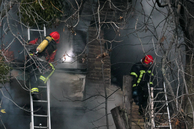 „Reuters“/„Scanpix“ nuotr./Raketomis apšaudytas Kyjivas