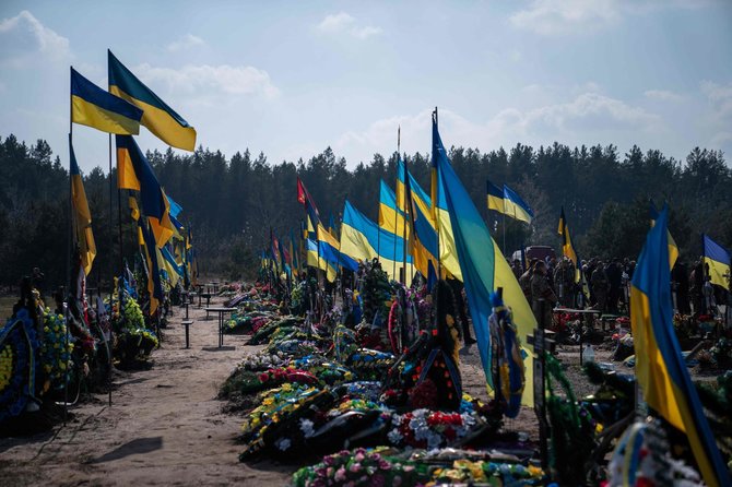 „AFP“/„Scanpix“/Ukrainos karių kapinės