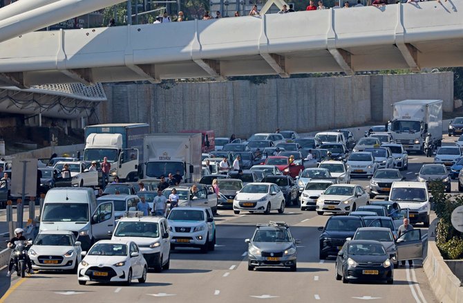 „AFP“/„Scanpix“/Greitkelyje Izraelyje sustoję automobiliai