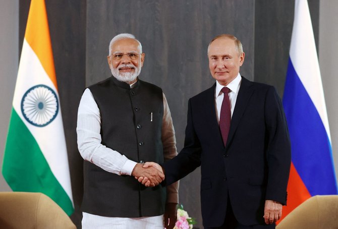 „AFP“/„Scanpix“/Rusijos prezidentas Vladimiras Putinas ir Indijos premjeras Narendra Modi