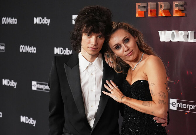 „Scanpix“ nuotr./Miley Cyrus ir Maxx Morando