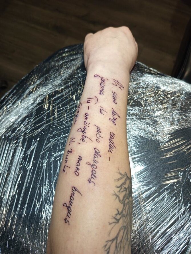 Asmeninio albumo nuotr./Daugvydo tatuiruotė