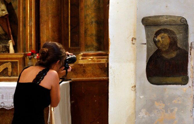 AFP/„Scanpix“ nuotr./Cecilios Giménez restauruota freska „Ecce Homo“