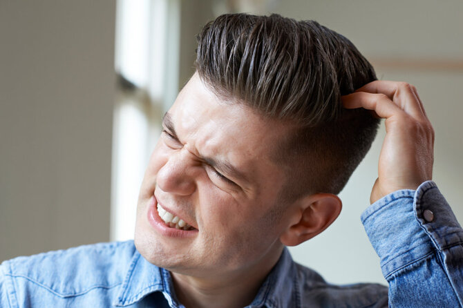 Shutterstock nuotr./Niežtinti galvos oda