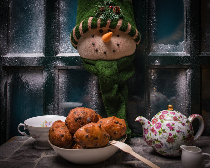 Shutterstock nuotr./Tradicinis olandiškas desertas "Oliebollen"