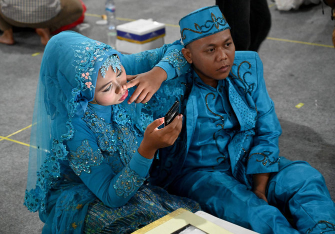 AFP/„Scanpix“ nuotr./Jaunavedžių pora Džakartoje