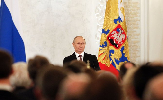 AFP/„Scanpix“ nuotr./Vladimiras Putinas kreipėsi į parlamentą.