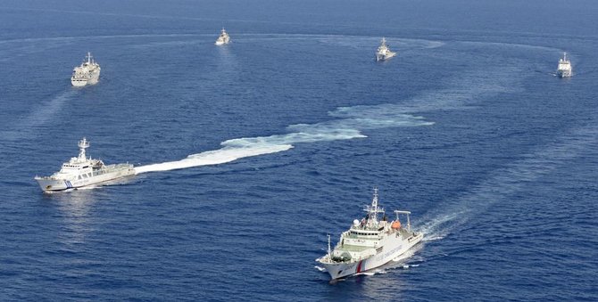 „Reuters“/„Scanpix“ nuotr./Kinijos laivai netoli Japonijos salos Senkaku