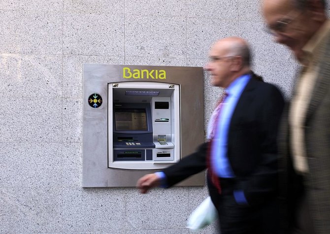 „Reuters“/„Scanpix“ nuotr./Bankomatas Madride