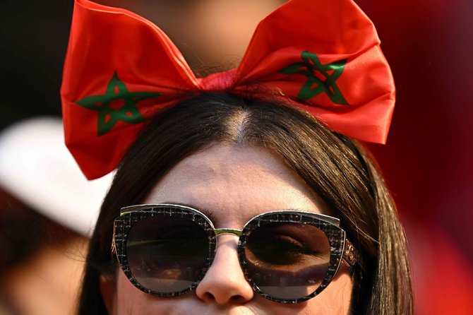 AFP/„Scanpix“ nuotr./Maroko futbolo sirgalė Maroke