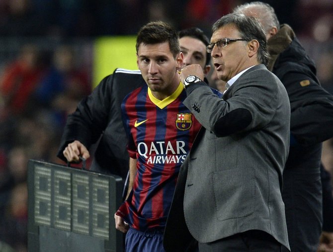 AFP/„Scanpix“ nuotr./Lionelis Messi ir Gerardo „Tata“ Martino 2014 m. „Barcelona“ klube