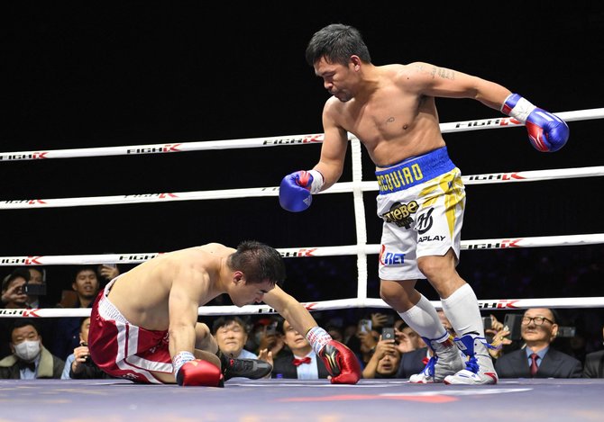 AFP/„Scanpix“ nuotr./DK Yoo ir Manny Pacquiao