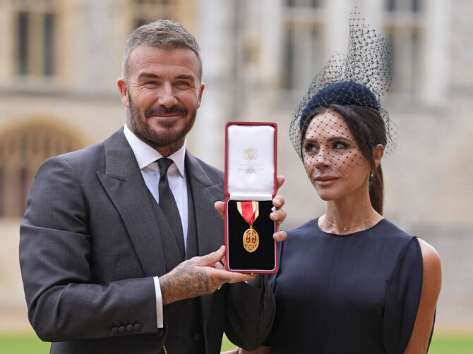AFP/„Scanpix“ nuotr./Davidas ir Victoria Beckhamai