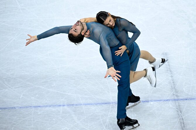 AFP/„Scanpix“ nuotr./Olimpiniai čempionai Guillaume Cizeronas ir Laurence Fournier Beaudry
