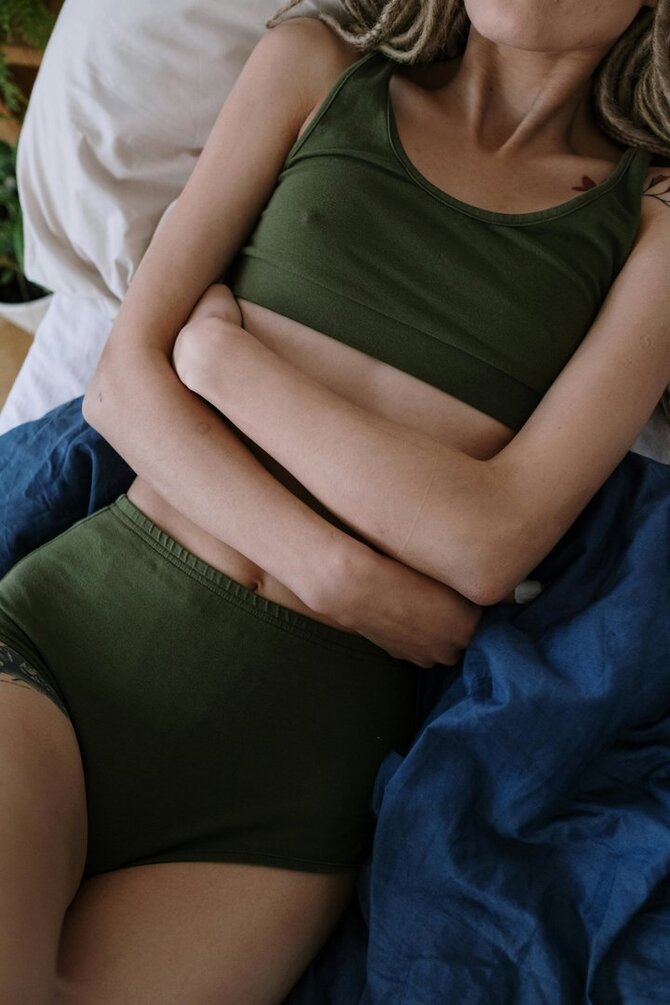 Pexels nuotr./Skausmingos mėnesinės