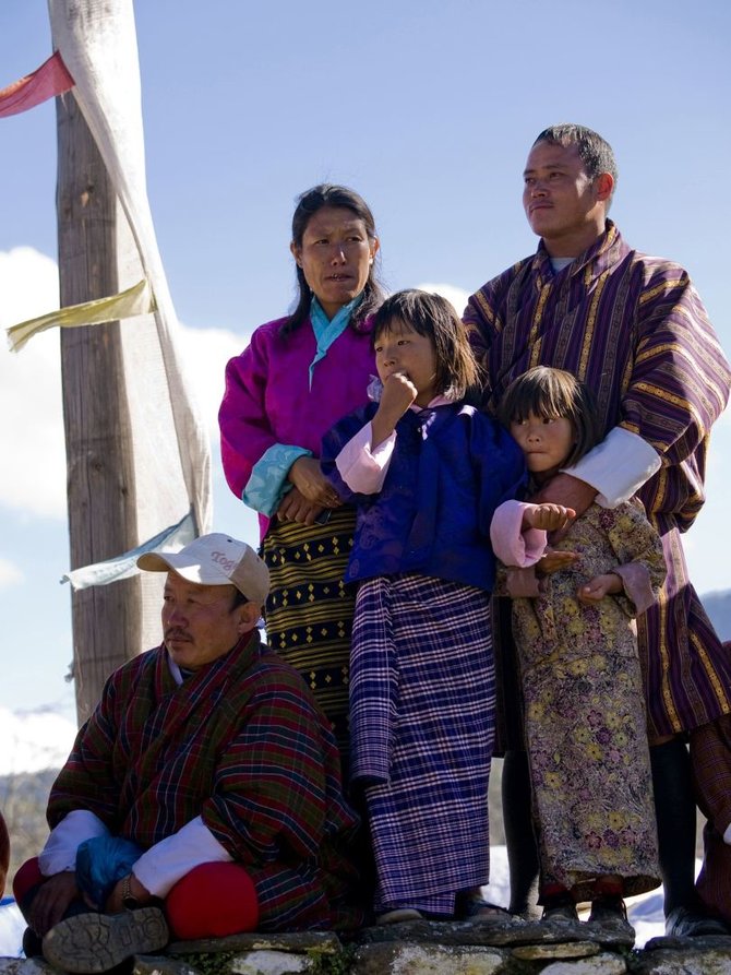 123rf.com /Butano gyventojai, apsirengę tradiciniais rūbais