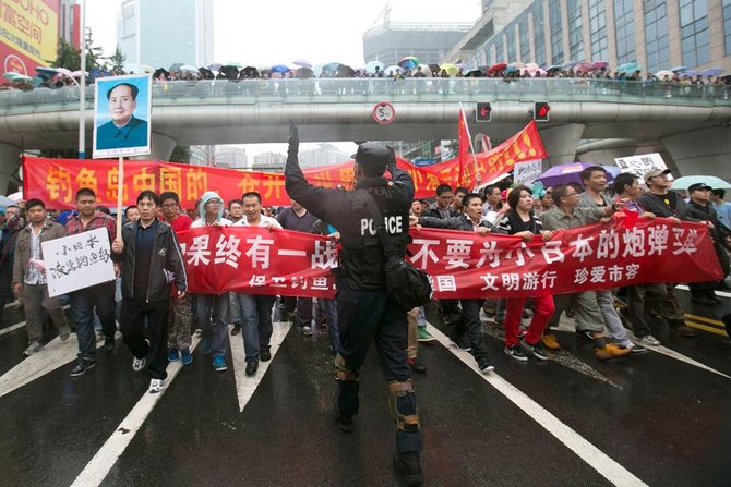 Scanpix nuotr./Protestas Kinijoje