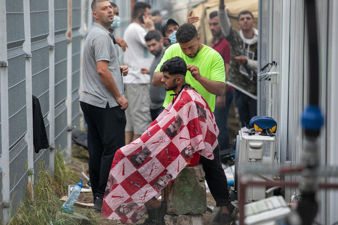 Juliaus Kalinsko / 15min nuotr./Migrantų kasdienybė Rūdninkų poligone