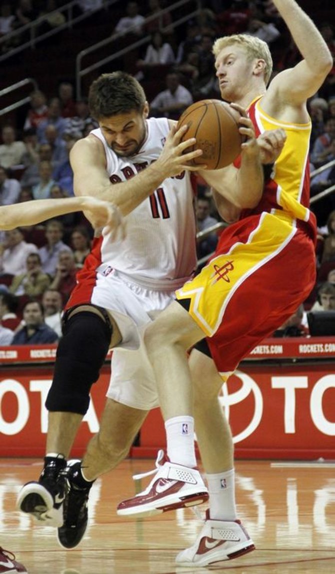 „Reuters“/„Scanpix“ nuotr./Linas Kleiza ir Chase'as Budingeris