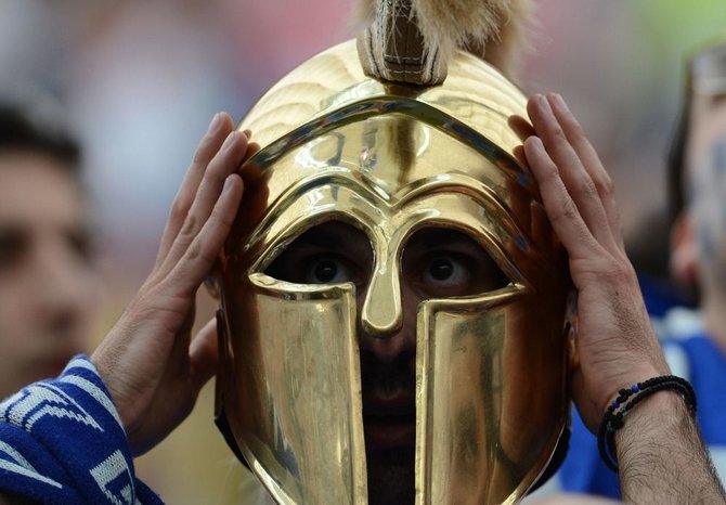 AFP/„Scanpix“ nuotr./Graikijos futbolo gerbėjas