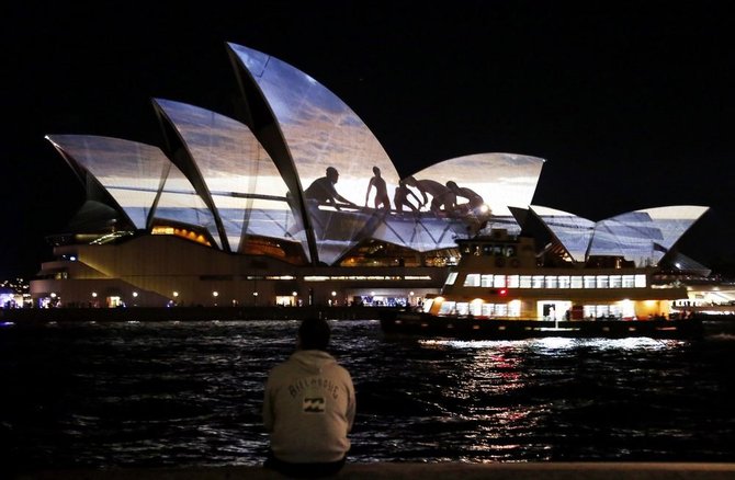 „Reuters“/„Scanpix“ nuotr./Vaizdo projekcija ant Sidnėjaus operos teatro