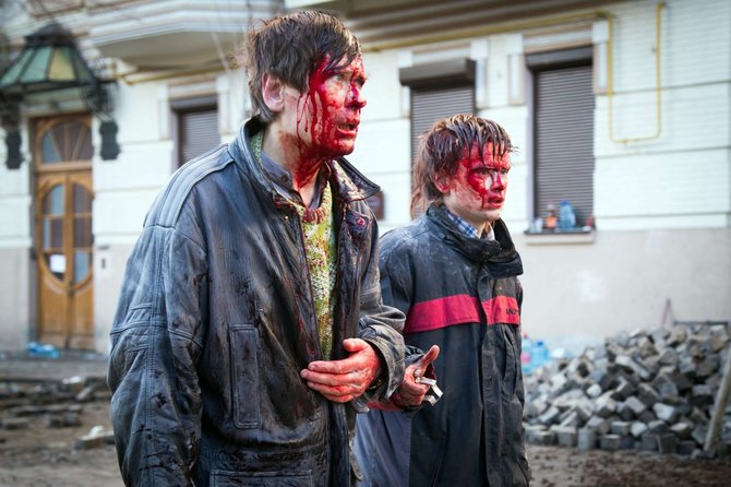 AFP/„Scanpix“ nuotr./Kijeve sužeisti protestuotojai 