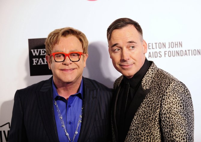„Reuters“/„Scanpix“ nuotr./Eltonas Johnas ir Davidas Furnishas