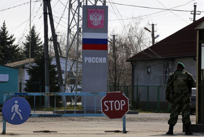 „Reuters“/„Scanpix“ nuotr./Ukrainos ir Rusijos pasienio punktas 