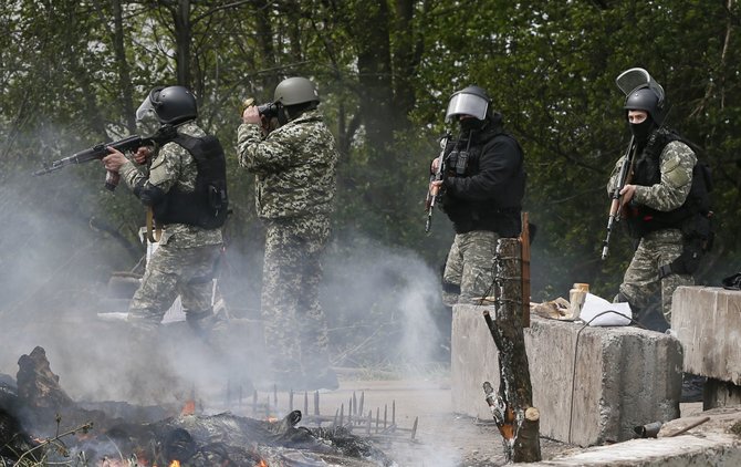 „Reuters“/„Scanpix“ nuotr./Ukrainos kariai Slovjanske