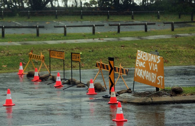 AFP/„Scanpix“ nuotr./Šiaurės Australija pasiekė du tropiniai audros