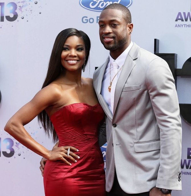 „Reuters“/„Scanpix“ nuotr./Dwyane'as Wade'as ir Gabrielle Union