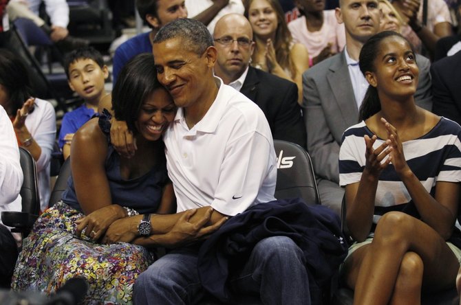 „Reuters“/„Scanpix“ nuotr./Michelle Obama ir Barackas Obama