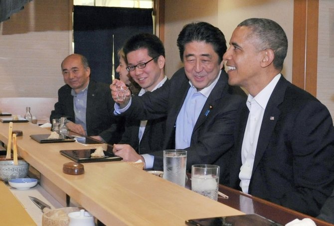„Reuters“/„Scanpix“ nuotr./Shinzo Abe ir Barackas Obama