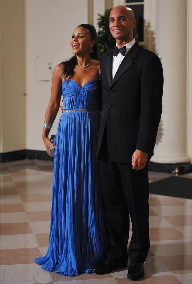 AFP/„Scanpix“ nuotr./Adrianas Fenty su pirmąja žmona Michelle (2009 m.)