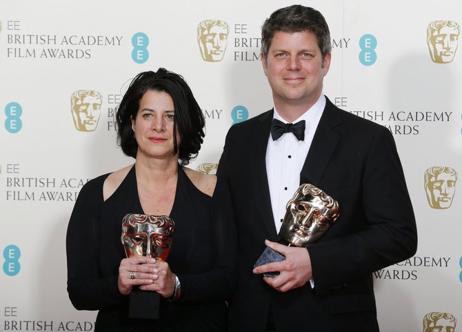 „Reuters“/„Scanpix“ nuotr./Anna Pinnock ir Adamas Stockhausenas apdovanoti už geriausią produkcijos dizainą filmui Viešbutis „Didysis Budapeštas“