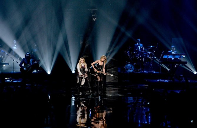 AFP/„Scanpix“ nuotr./Madonna ir Taylor Swift