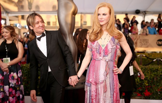 AFP/„Scanpix“ nuotr./Keithas Urbanas ir Nicole Kidman 
