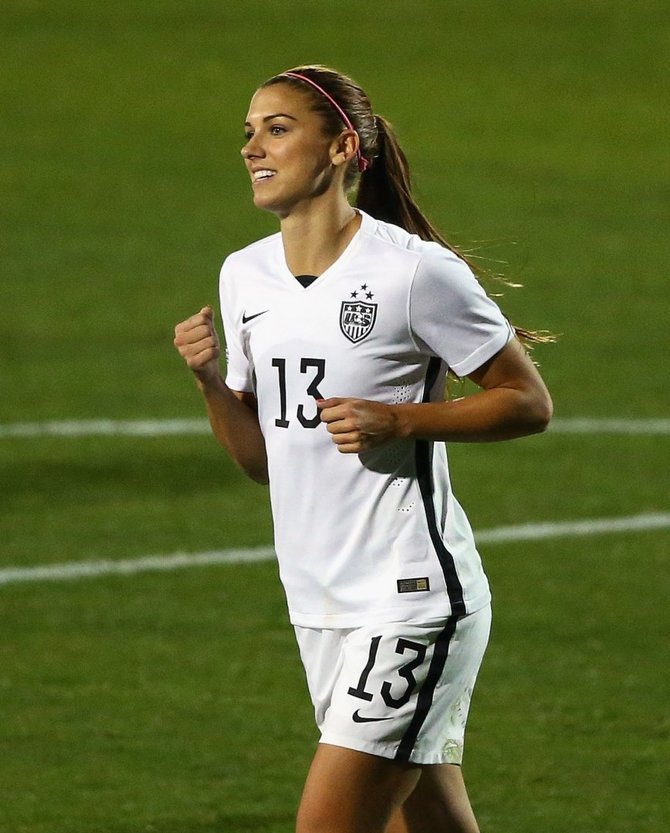 AFP/„Scanpix“ nuotr./Seksualiausia sportininkė: futbolininkė Alex Morgan