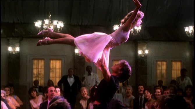 „Scanpix“ nuotr./Patrickas Swayze'as ir Jennifer Grey filme „Purvini šokiai“ (1987 m.)