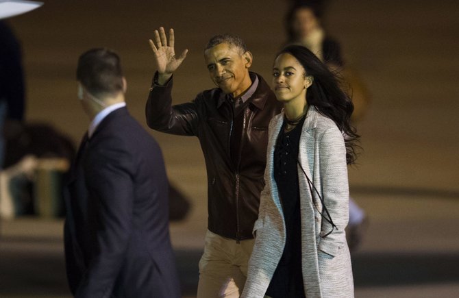 „Scanpix“/AP nuotr./Barackas Obama su dukra Malia