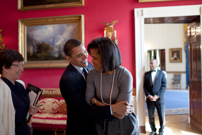 „Reuters“/„Scanpix“ nuotr./Barackas Obama su žmona Michelle (2009 m.)