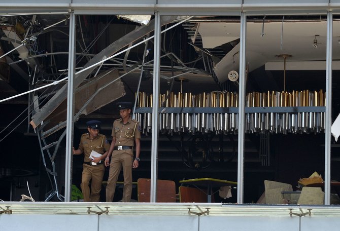 AFP/„Scanpix“ nuotr./Šri Lankos bažnyčiose ir viešbučiuose nugriaudėjo sprogimai